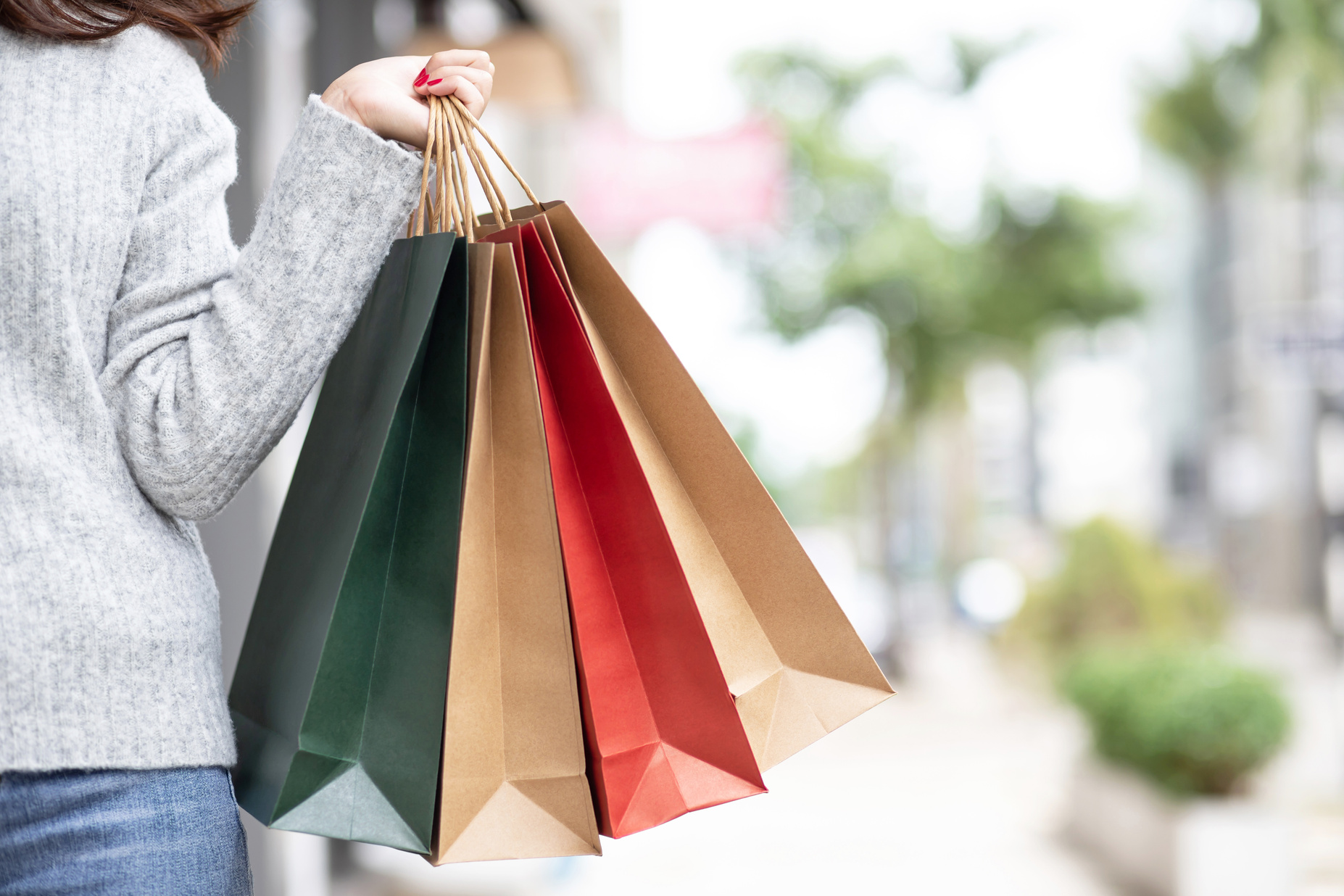 Woman Holding Shopping Bags